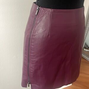 Maroon faux leather skirt with zippers on both side